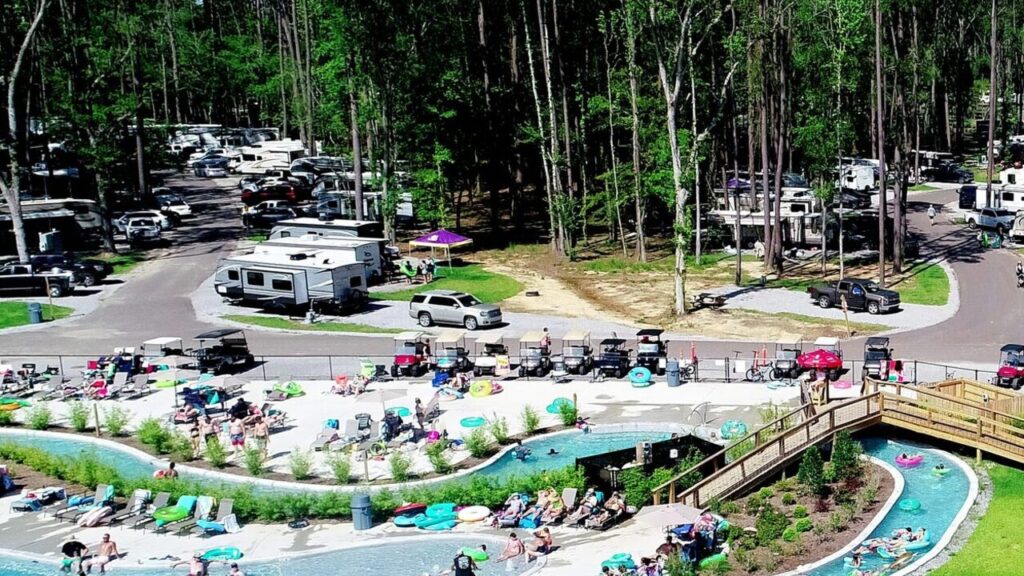 Aerial view of the lazy river, pools and RV sites at Fireside RV Resort in Ponchatoula