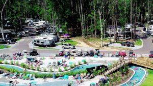 Aerial view of the lazy river, pools and RV sites at Fireside RV Resort in Ponchatoula