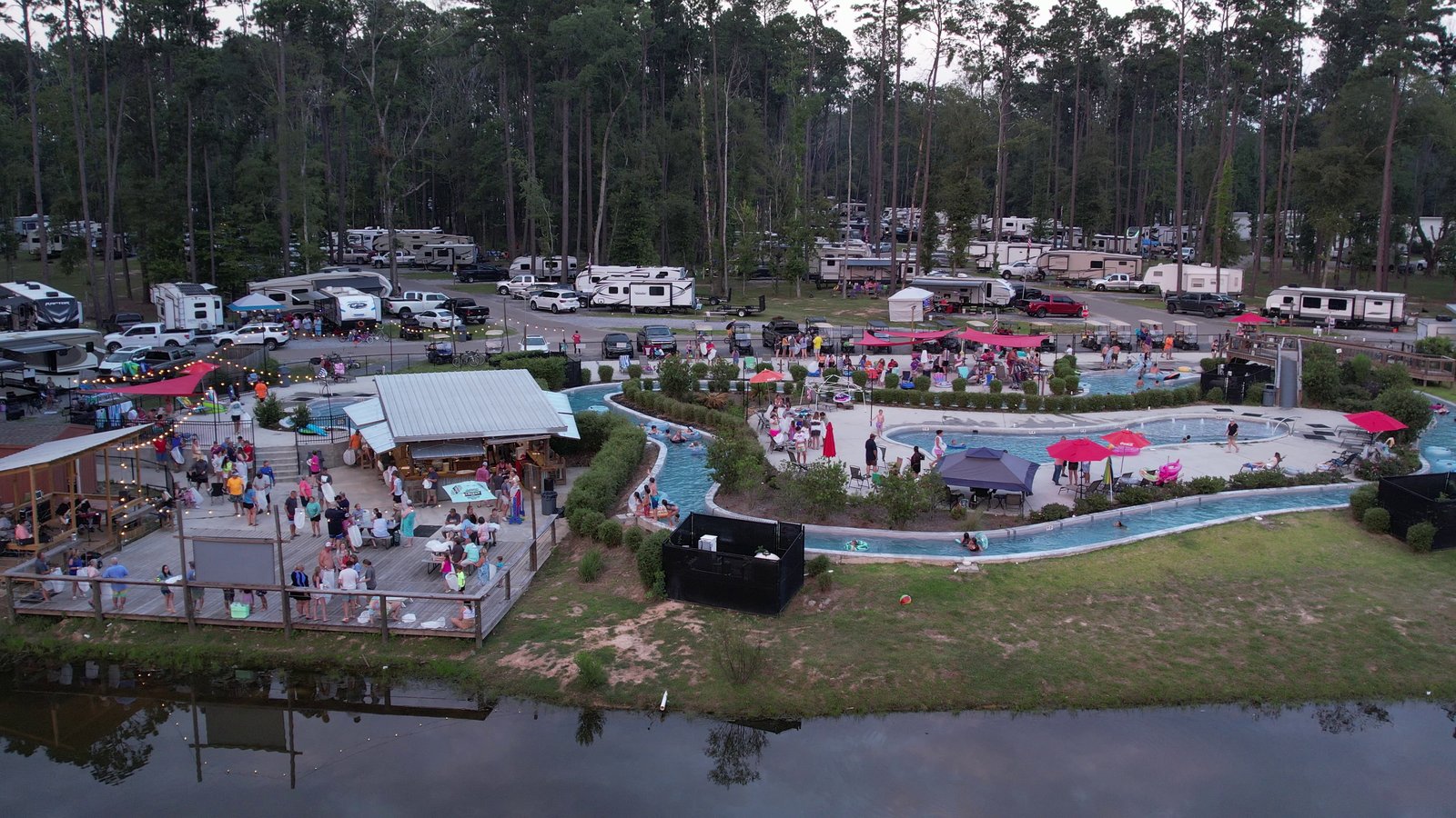Aerial view of the lazy river and pools at a Gulf Coast RV resort near Ponchatoula, Louisiana