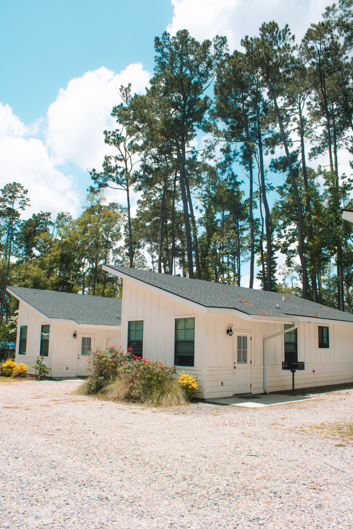 Two modern cabins among the pines at Fireside RV Resort in Ponchatoula, Louisiana
