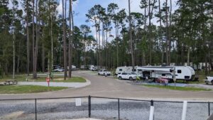 RV sites with full hookups among tall pines at Fireside RV Resort near New Orleans