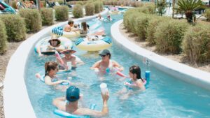 People floating tubes on the lazy river at Fireside RV Resort near New Orleans, Louisiana
