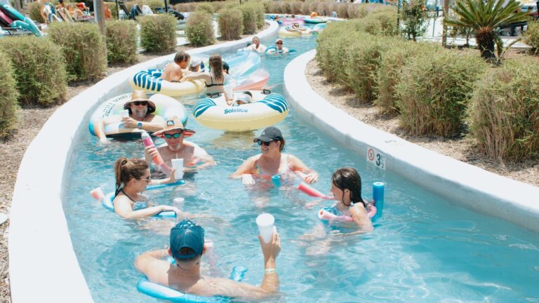 People floating tubes on the lazy river at Fireside RV Resort near New Orleans, Louisiana
