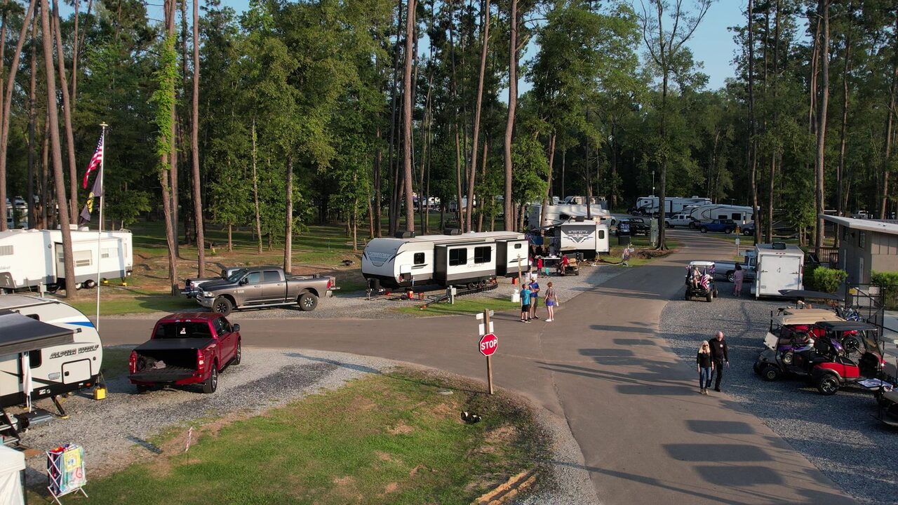 Aerial view of RVs and golf carts at Fireside RV Resort near Baton Rouge
