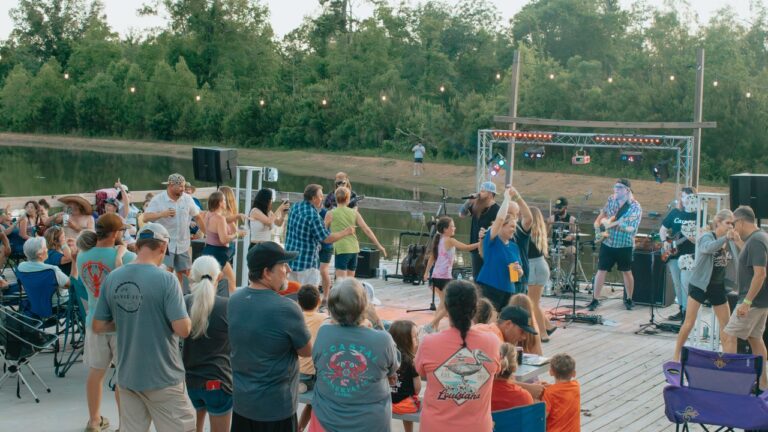 Guests dancing to a live band on the deck at a Ponchatoula RV park in Louisiana