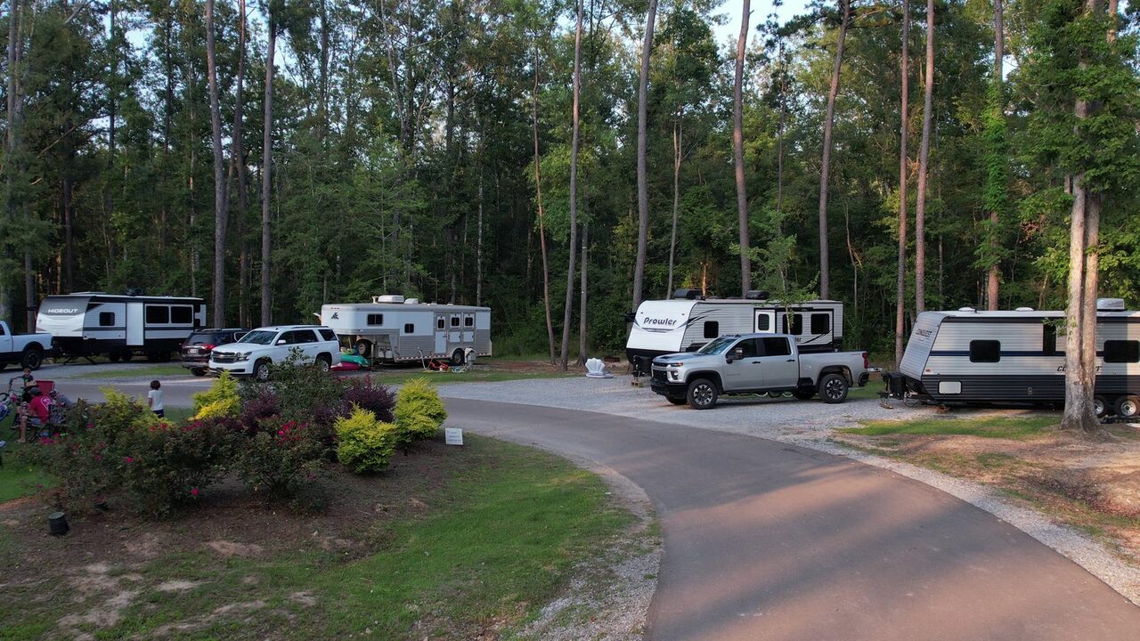 Spacious wooded RV sites with room between rigs at Fireside RV Resort