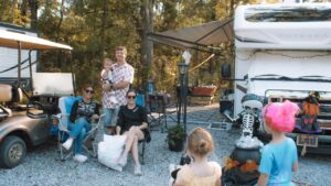 Guests relaxing at a decorated October RV site at Fireside RV Resort in Ponchatoula, Louisiana